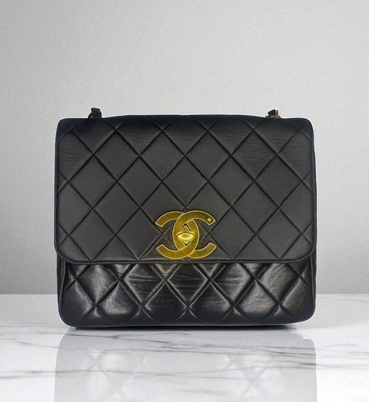 CHANEL Black Quilted Flap 24K Gold CC Logo Leather Shoulder Bag